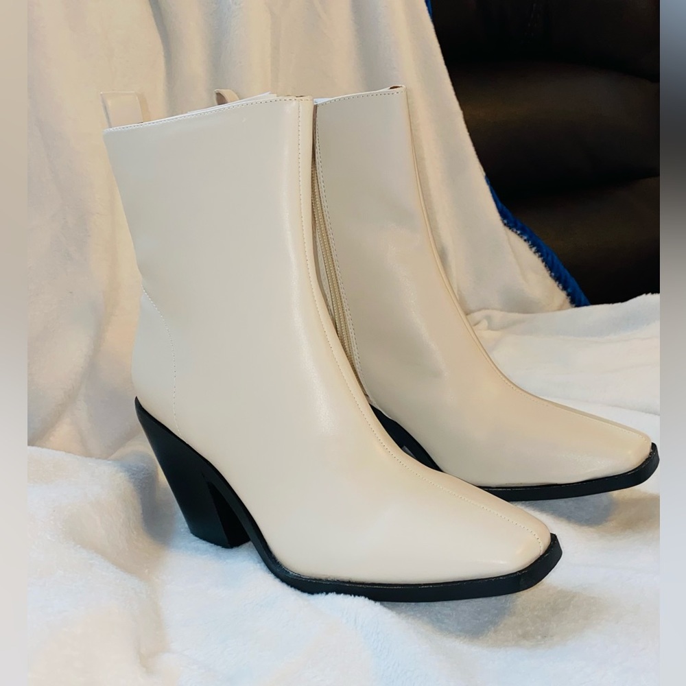 White heeled boot